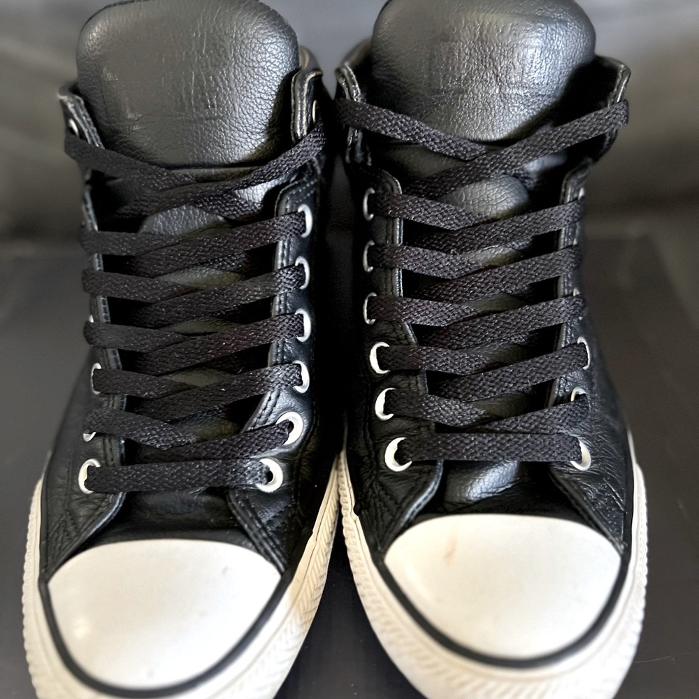 Black Converse High-Top Sneakers with White Toe in used condition